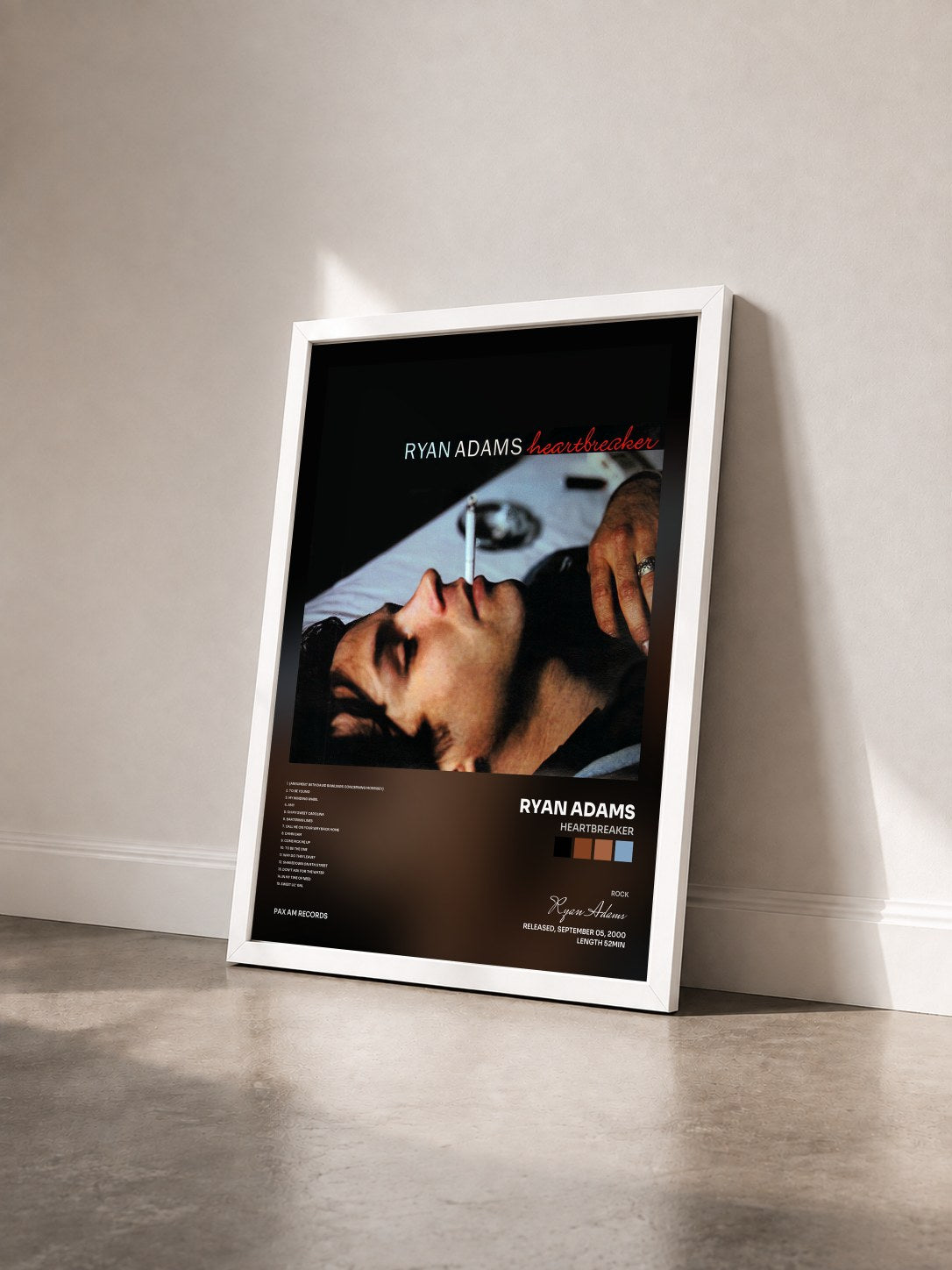 #blanc Tableau de l'album Heartbreaker de Ryan Adams vu de trois quarts, cadre blanc