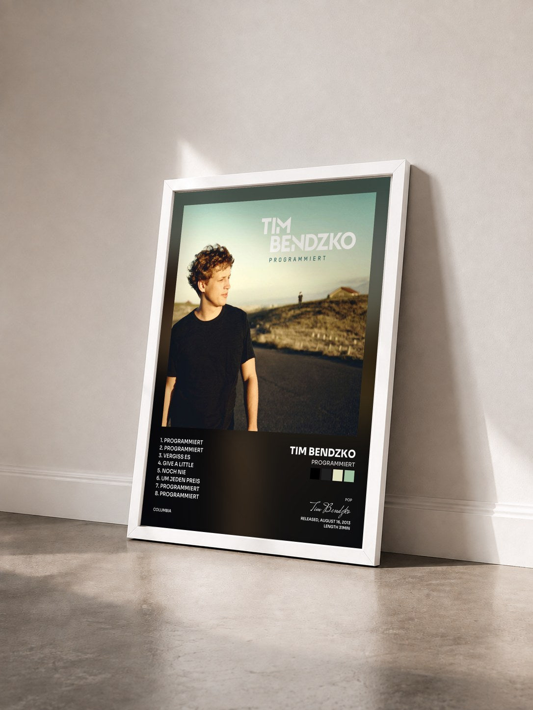 #blanc Tableau de l'album Programmiert de Tim Bendzko vu de trois quarts, cadre blanc