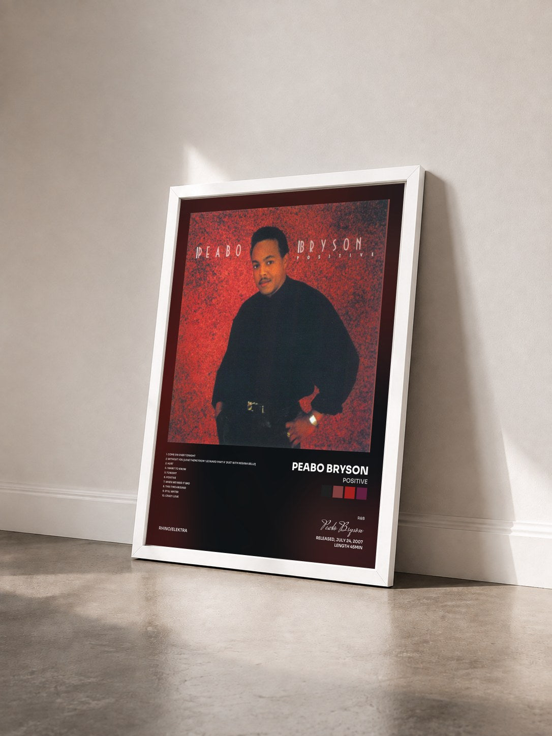 #blanc Tableau de l'album Positive de Peabo Bryson vu de trois quarts, cadre blanc