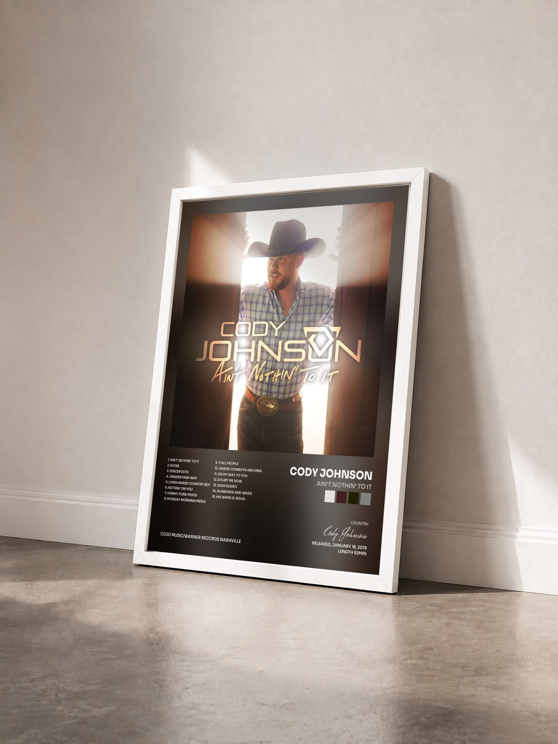 #blanc Tableau de l'album Ain't Nothin' to It de Cody Johnson vu de trois quarts, cadre blanc