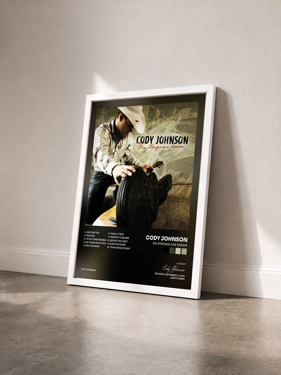 #blanc Tableau de l'album Six Strings One Dream de Cody Johnson vu de trois quarts, cadre blanc