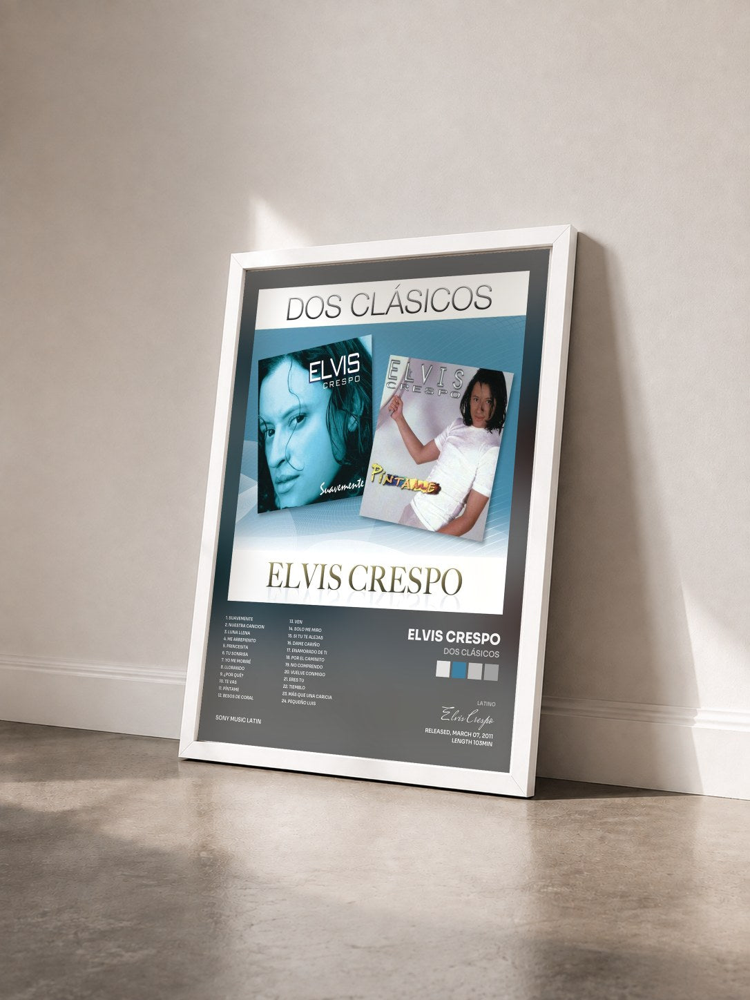 #blanc Tableau de l'album Dos Clásicos de Elvis Crespo vu de trois quarts, cadre blanc
