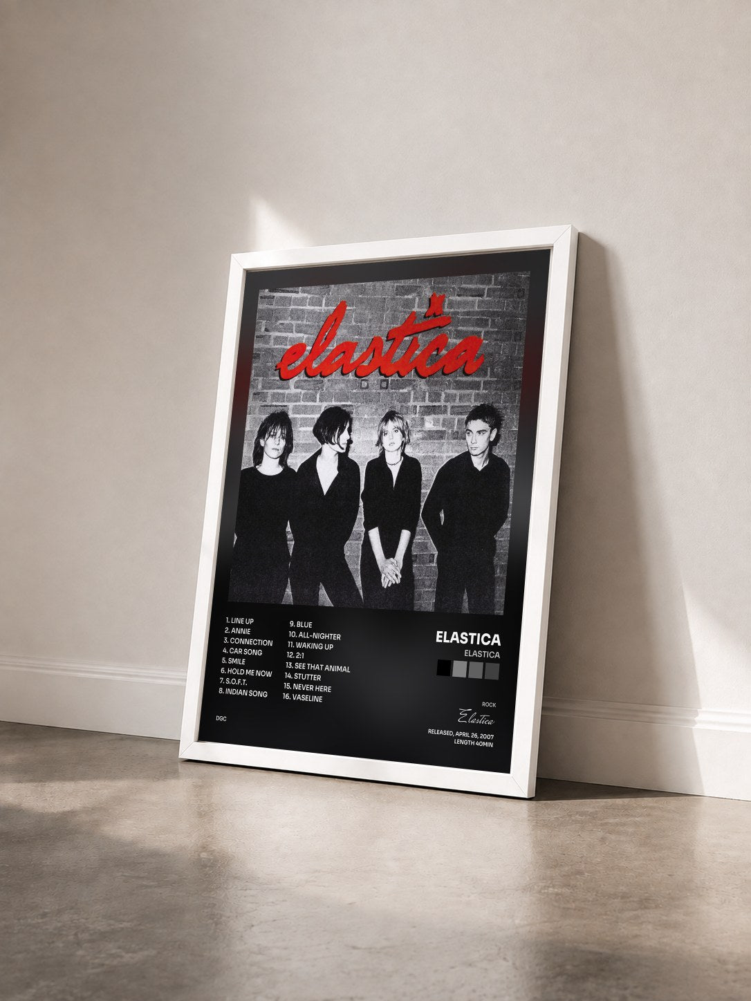 #blanc Tableau de l'album Elastica de Elastica vu de trois quarts, cadre blanc