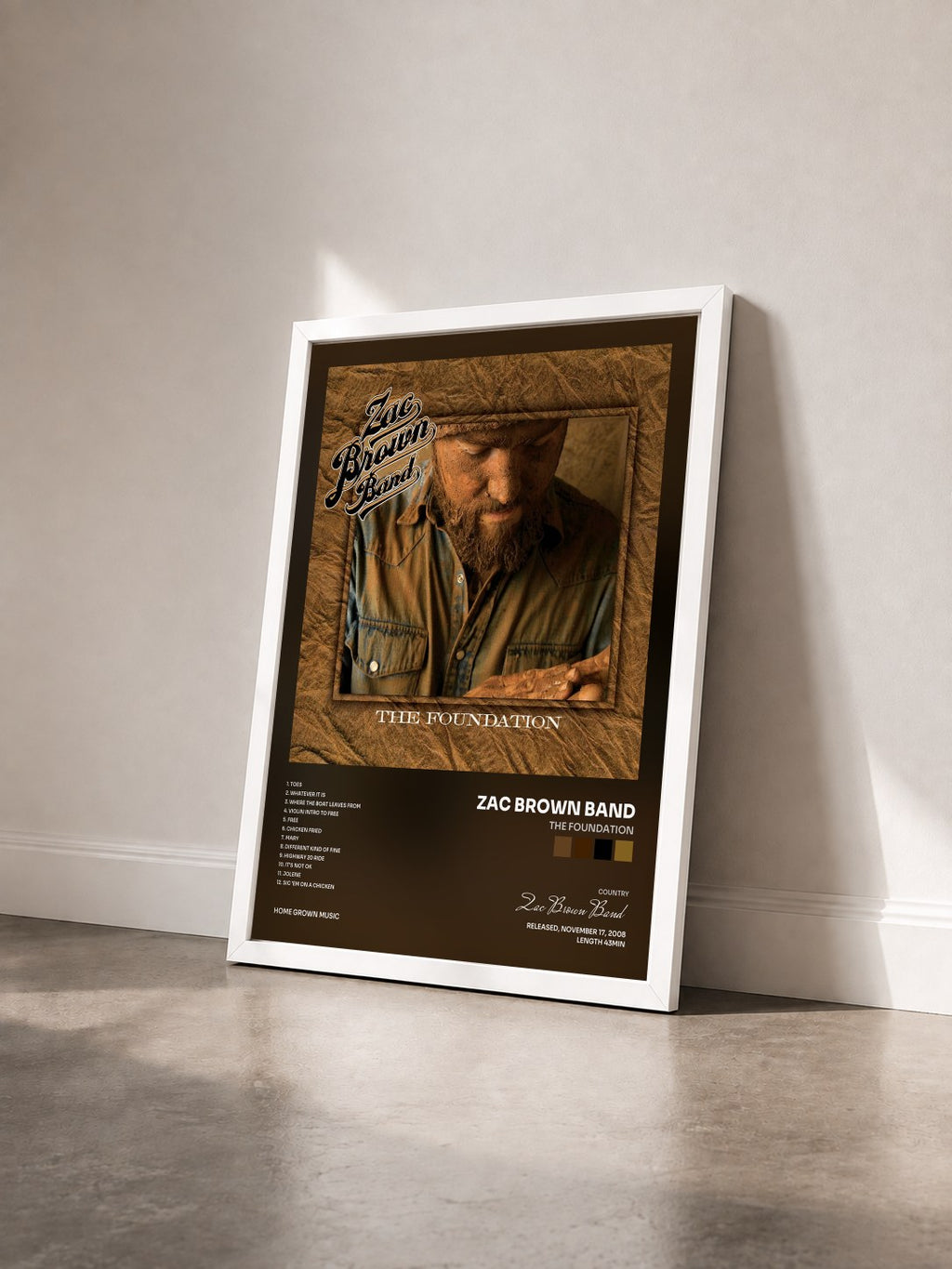 #blanc The Foundation by Zac Brown Band as a framed art print seen at an angle, white frame