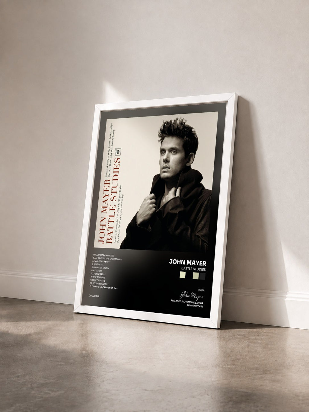 #blanc Tableau de l'album Battle Studies de John Mayer vu de trois quarts, cadre blanc