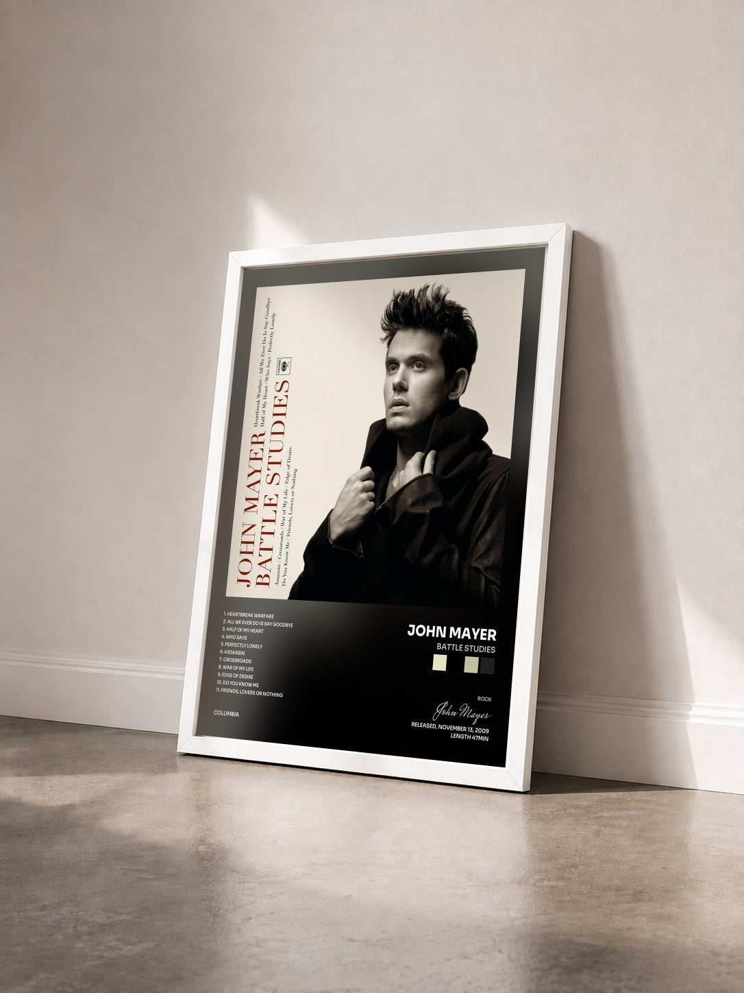 #blanc Tableau de l'album Battle Studies de John Mayer vu de trois quarts, cadre blanc