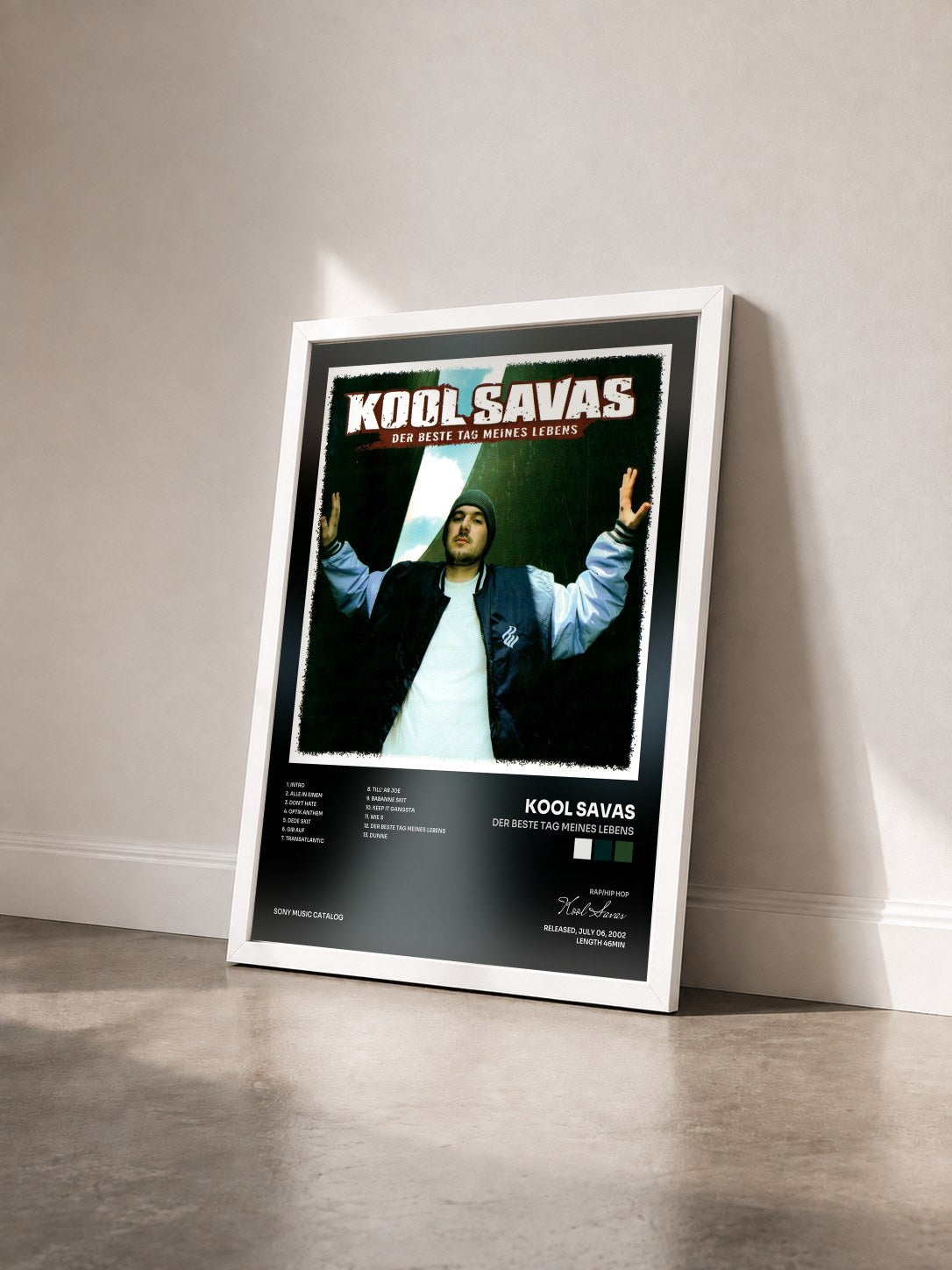 #blanc Tableau de l'album Der beste Tag meines Lebens de Kool Savas vu de trois quarts, cadre blanc