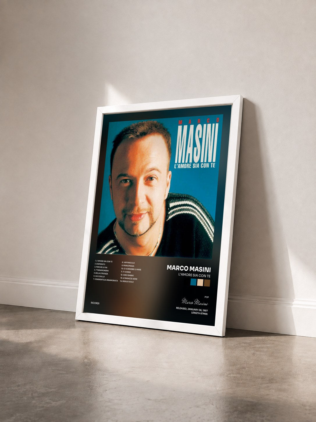 #blanc Tableau de l'album L'Amore Sia Con Te de Marco Masini vu de trois quarts, cadre blanc