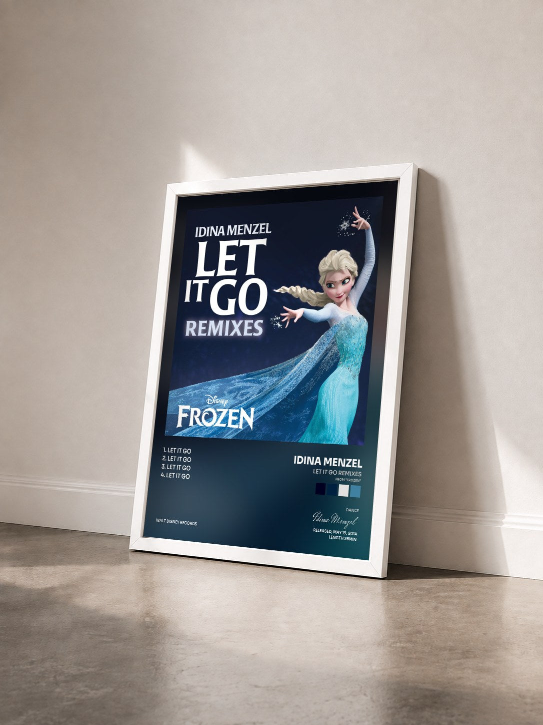 #blanc Tableau de l'album Let It Go Remixes (From "Frozen") de Idina Menzel vu de trois quarts, cadre blanc