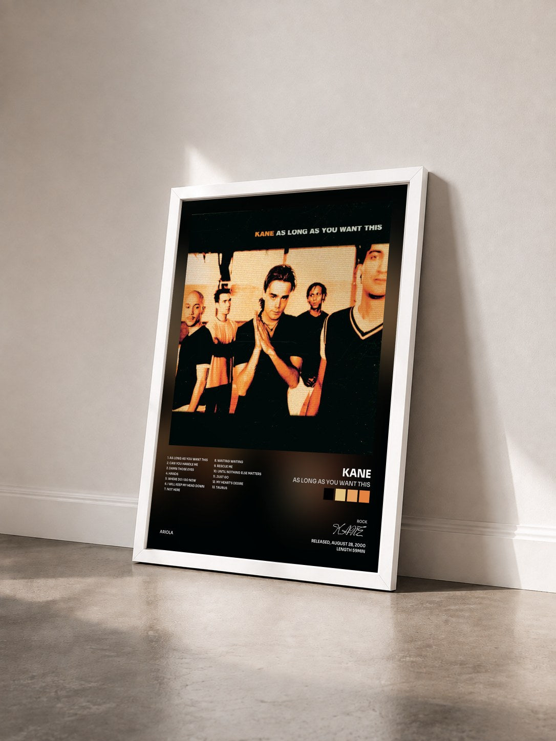 #blanc Tableau de l'album As Long As You Want This de KANE vu de trois quarts, cadre blanc