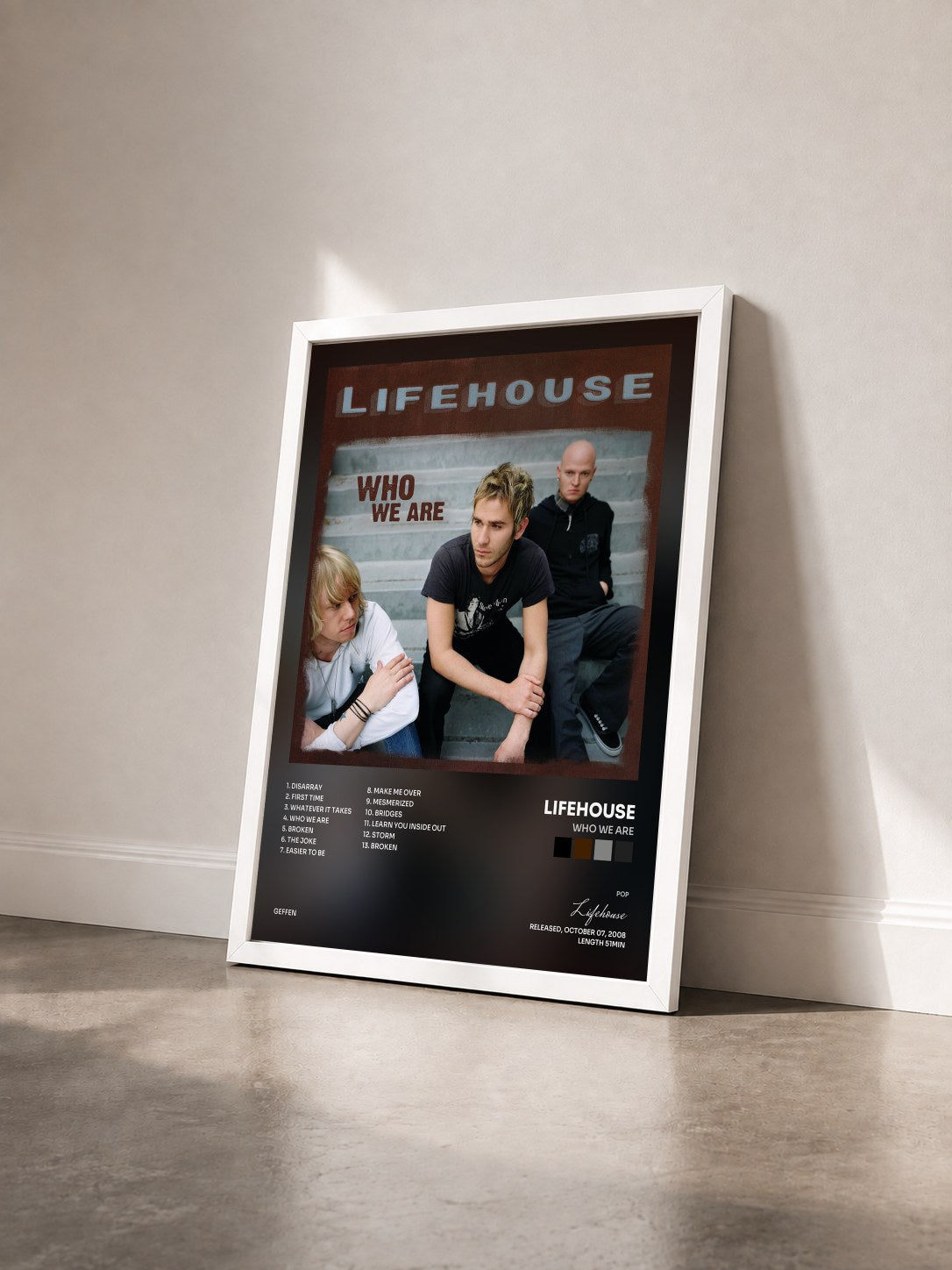 #blanc Tableau de l'album Who We Are de Lifehouse vu de trois quarts, cadre blanc