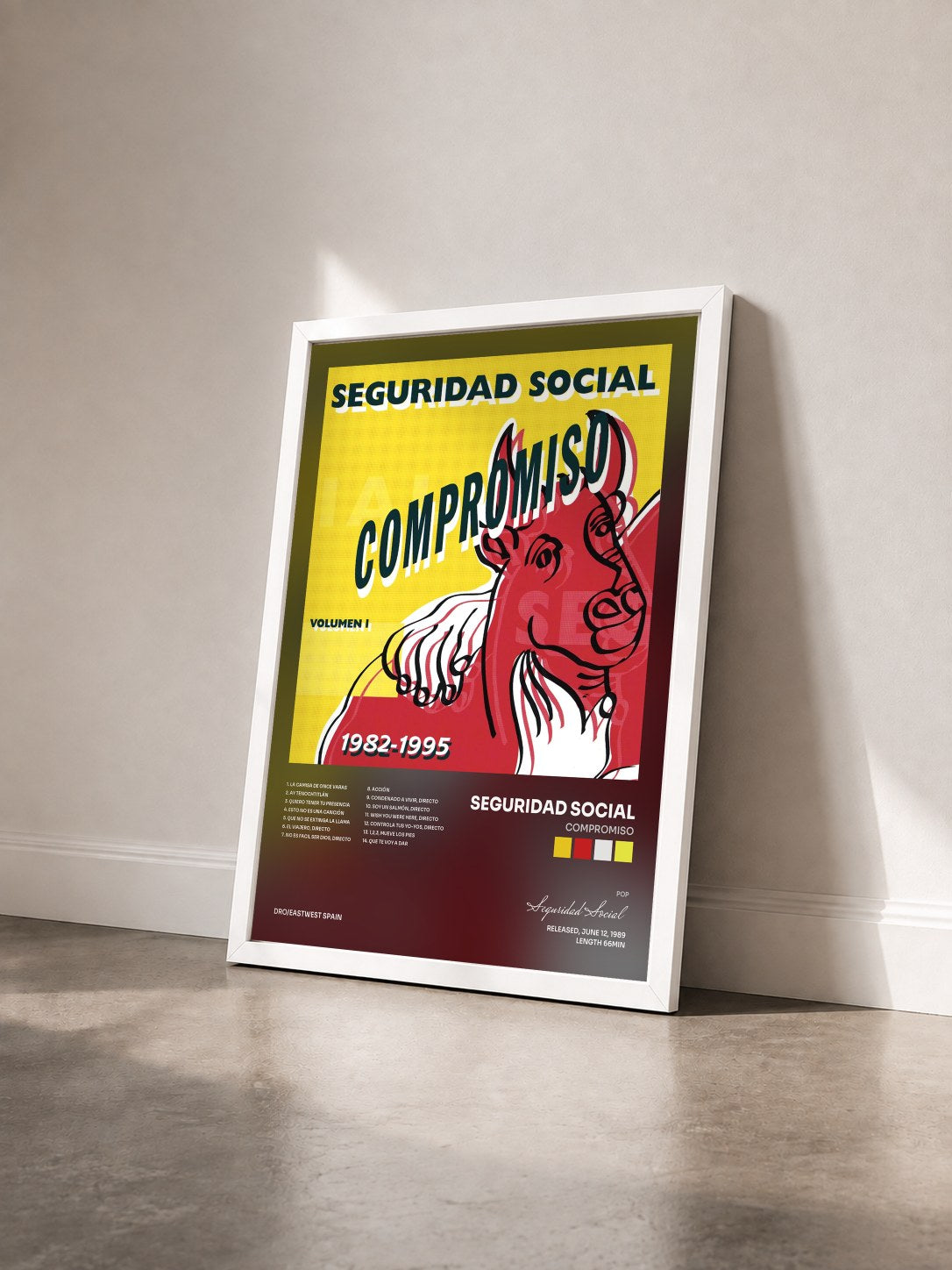 #blanc Tableau de l'album Compromiso de Seguridad Social vu de trois quarts, cadre blanc