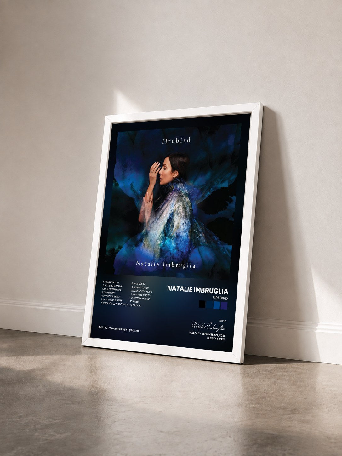 #blanc Tableau de l'album Firebird de Natalie Imbruglia vu de trois quarts, cadre blanc