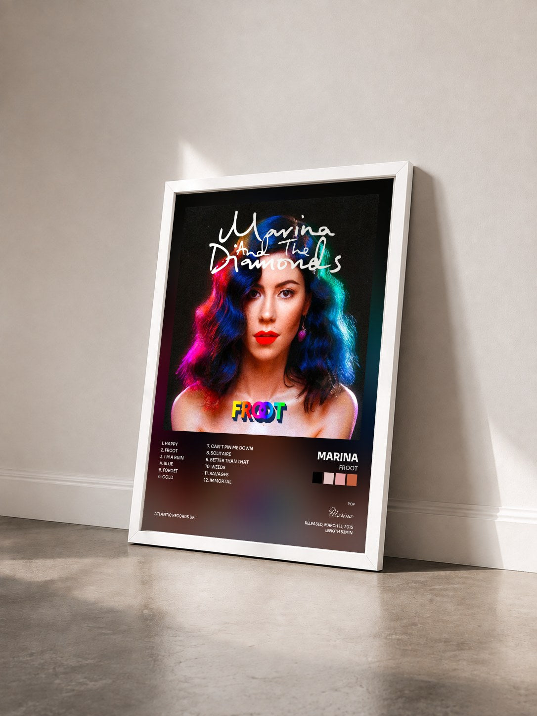 #blanc Tableau de l'album Froot de Marina vu de trois quarts, cadre blanc