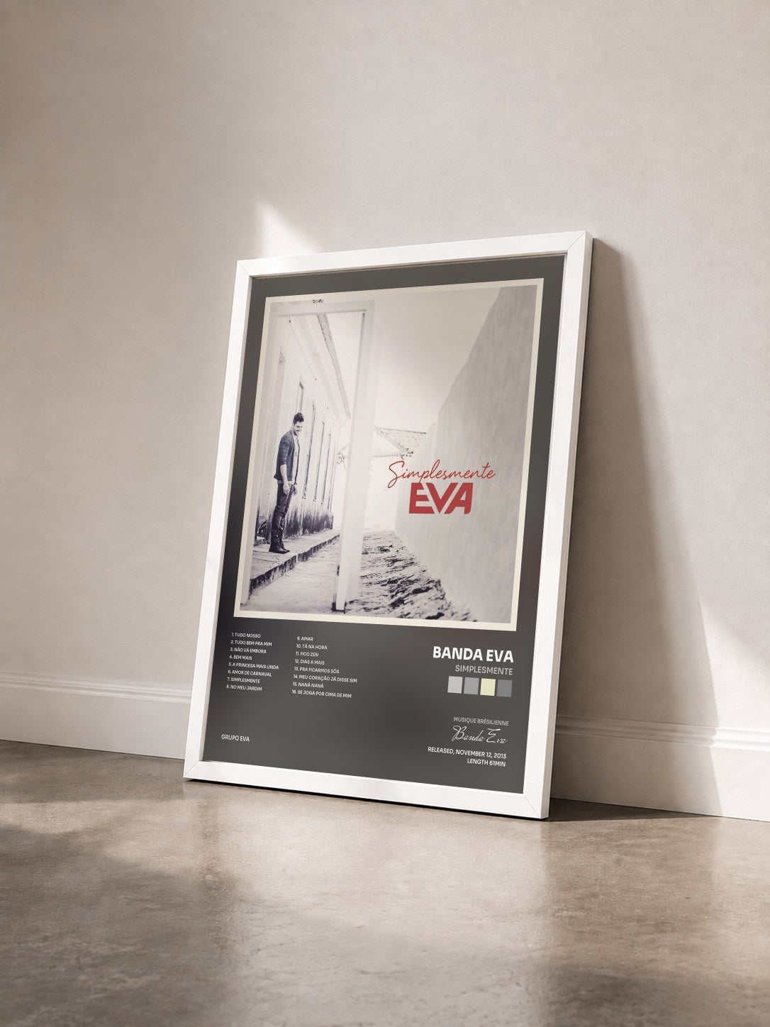 #blanc Tableau de l'album Simplesmente de Banda Eva vu de trois quarts, cadre blanc