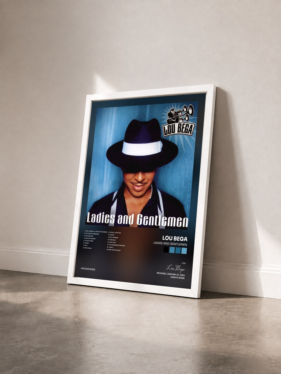 #blanc Tableau de l'album Ladies And Gentlemen de Lou Bega vu de trois quarts, cadre blanc