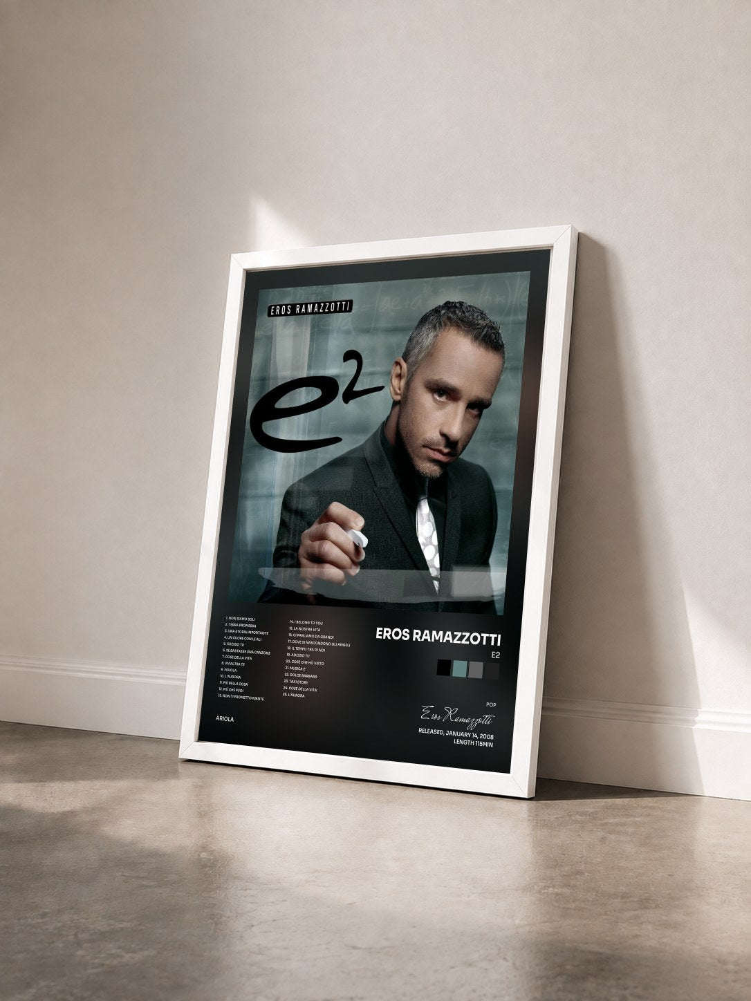 #blanc Tableau de l'album E2 de Eros Ramazzotti vu de trois quarts, cadre blanc