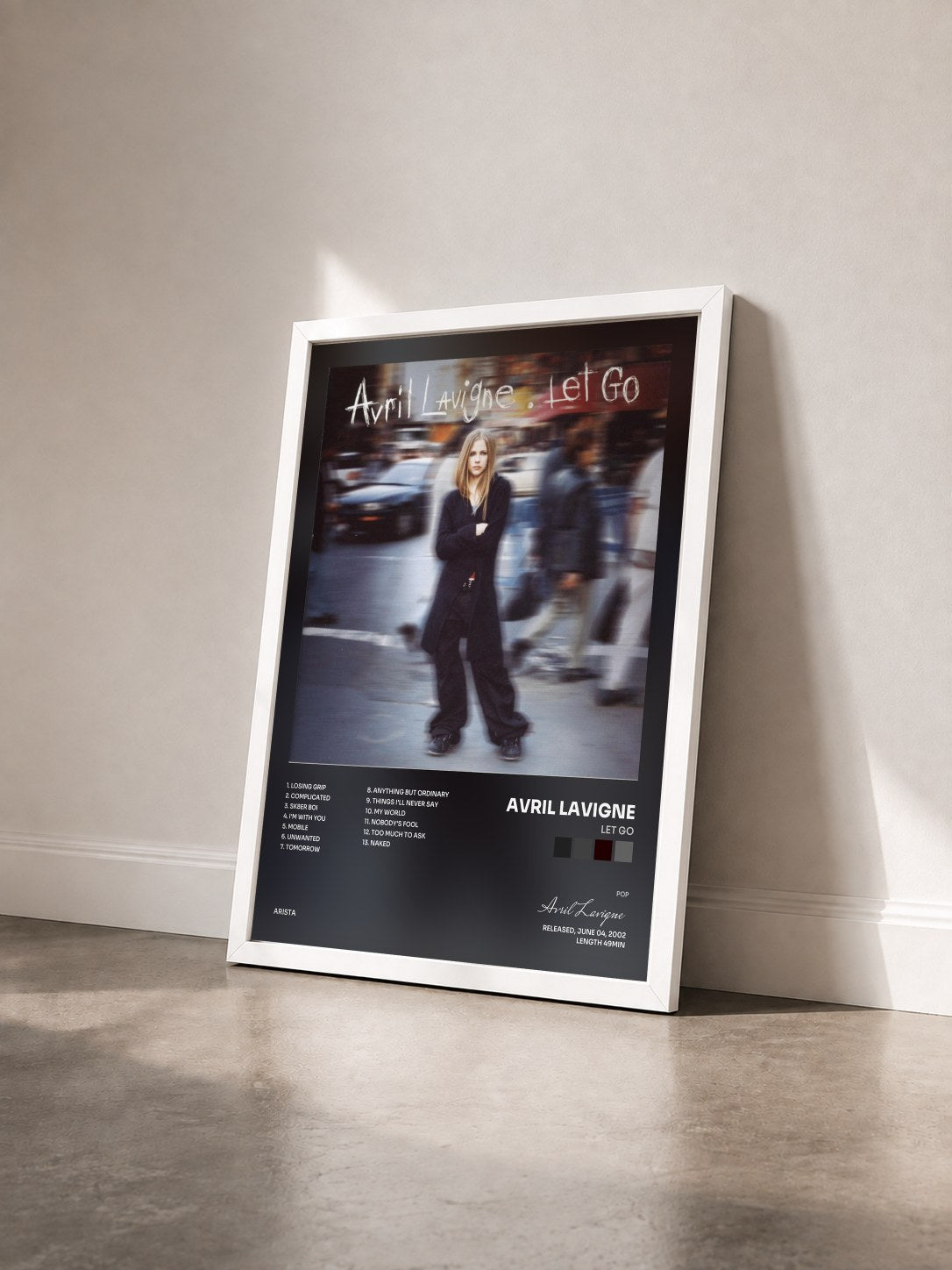 #blanc Tableau de l'album Let Go de Avril Lavigne vu de trois quarts, cadre blanc