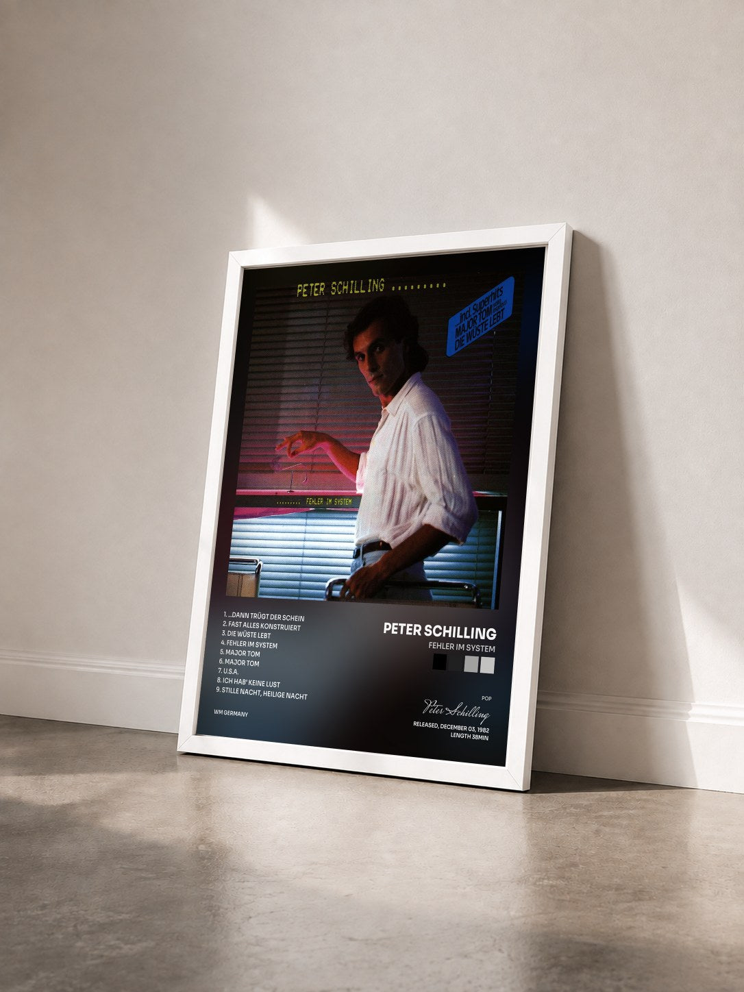 #blanc Tableau de l'album Fehler Im System de Peter Schilling vu de trois quarts, cadre blanc