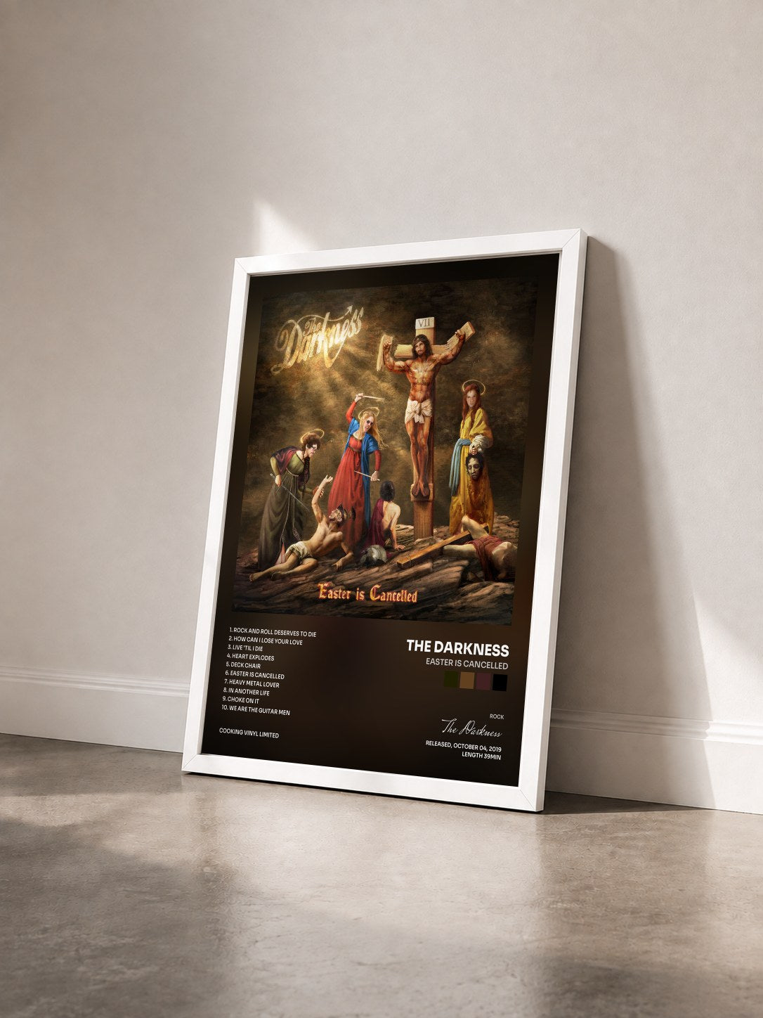 #blanc Tableau de l'album Easter is Cancelled de The Darkness vu de trois quarts, cadre blanc