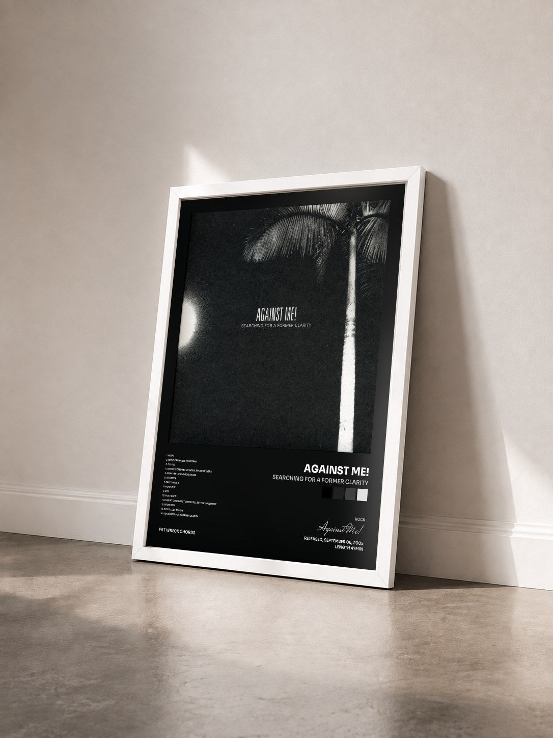 #blanc Tableau de l'album Searching for a Former Clarity de Against Me! vu de trois quarts, cadre blanc