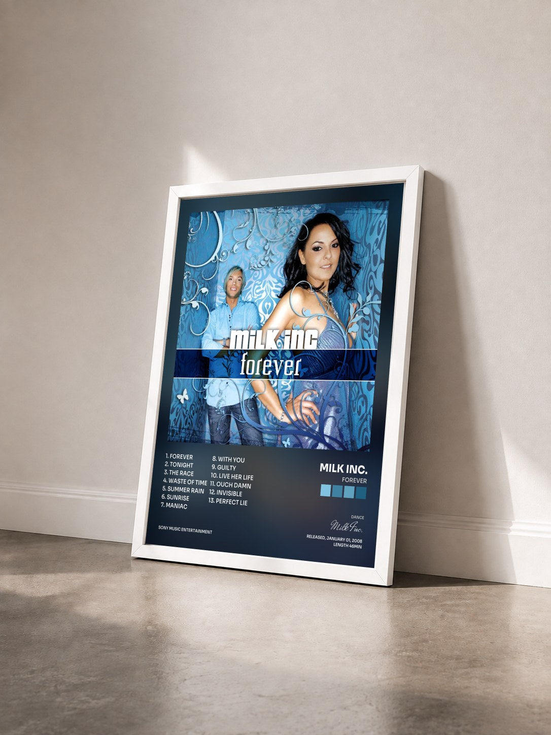 #blanc Tableau de l'album Forever de Milk Inc. vu de trois quarts, cadre blanc