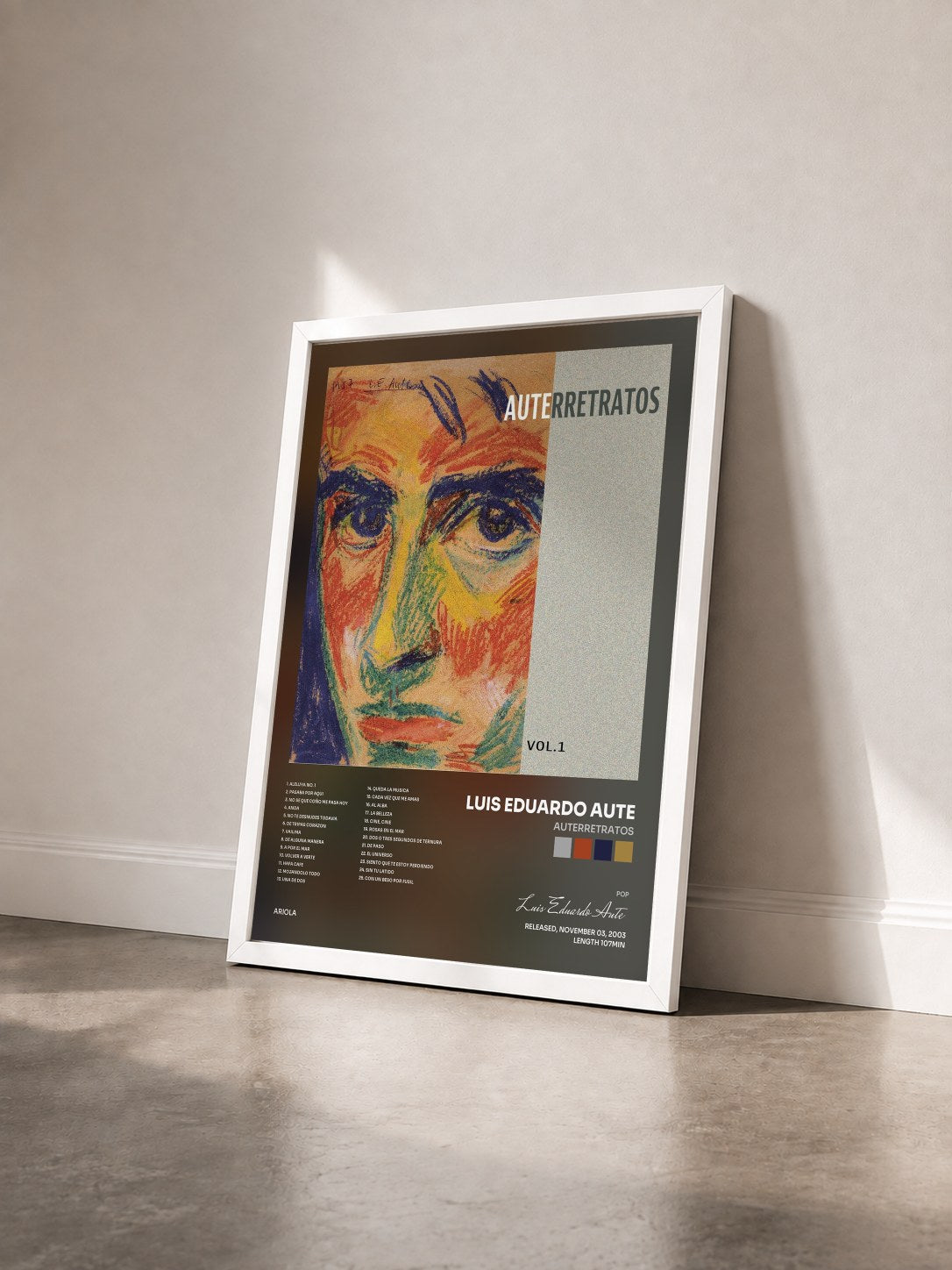 #blanc Tableau de l'album Auterretratos de Luis Eduardo Aute vu de trois quarts, cadre blanc