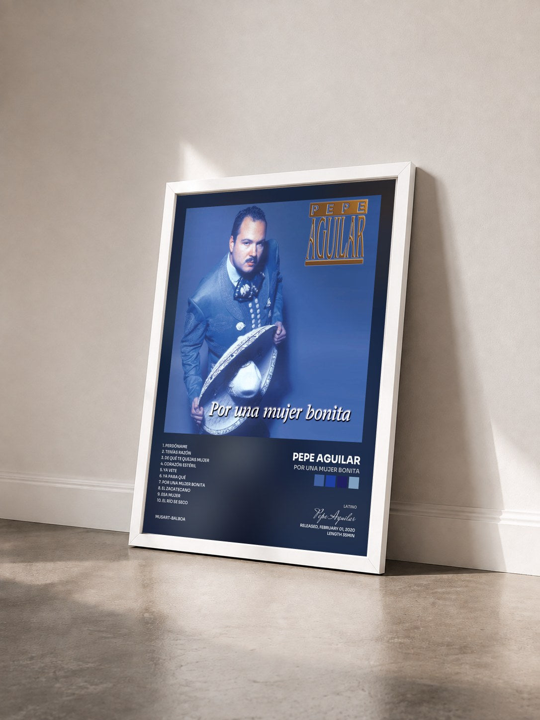 #blanc Tableau de l'album Por Una Mujer Bonita de Pepe Aguilar vu de trois quarts, cadre blanc