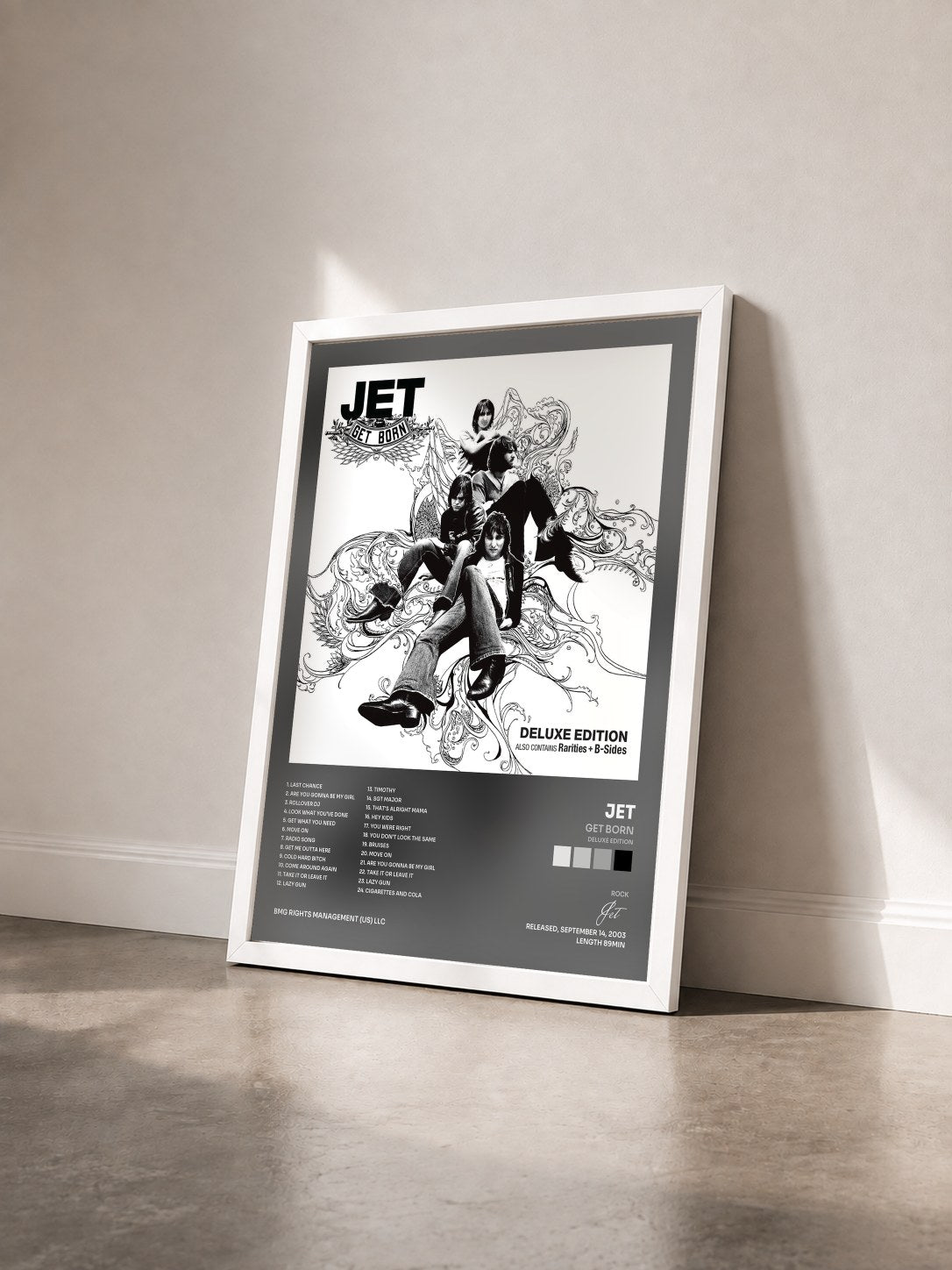 #blanc Tableau de l'album Get Born (Deluxe Edition) de Jet vu de trois quarts, cadre blanc