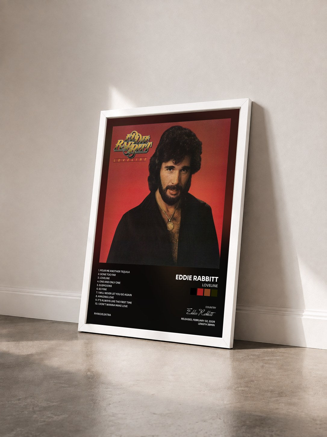 #blanc Tableau de l'album Loveline de Eddie Rabbitt vu de trois quarts, cadre blanc