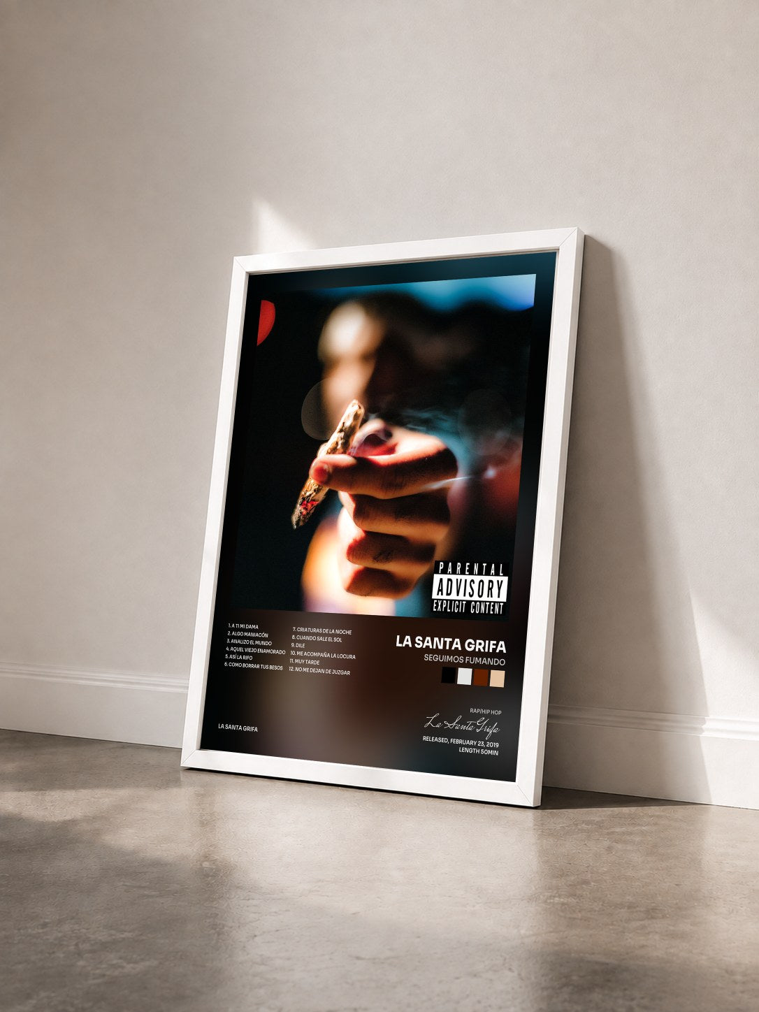 #blanc Tableau de l'album Seguimos Fumando de La Santa Grifa vu de trois quarts, cadre blanc