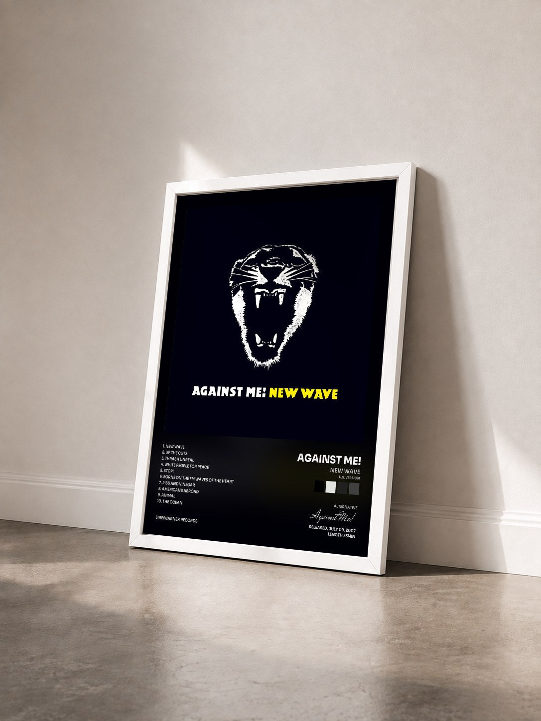 #blanc Tableau de l'album New Wave (U.S. Version) de Against Me! vu de trois quarts, cadre blanc