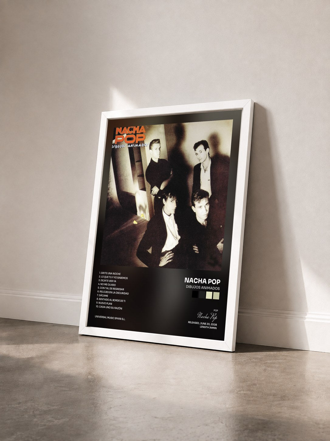 #blanc Tableau de l'album Dibujos Animados de Nacha Pop vu de trois quarts, cadre blanc