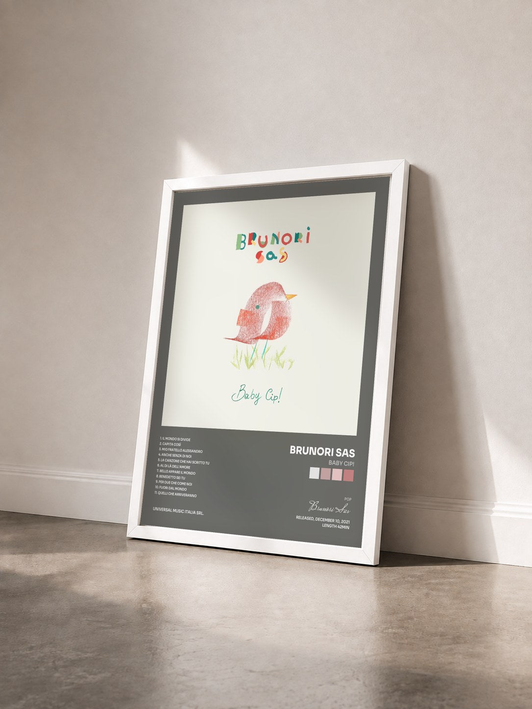 #blanc Tableau de l'album Baby Cip! de Brunori Sas vu de trois quarts, cadre blanc
