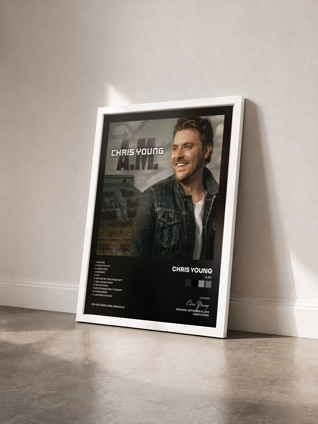 #blanc Tableau de l'album A.M. de Chris Young vu de trois quarts, cadre blanc