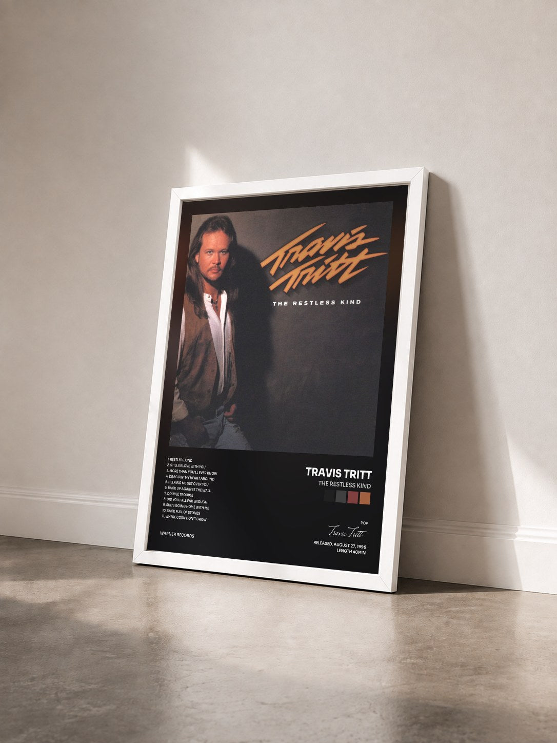 #blanc Tableau de l'album The Restless Kind de Travis Tritt vu de trois quarts, cadre blanc