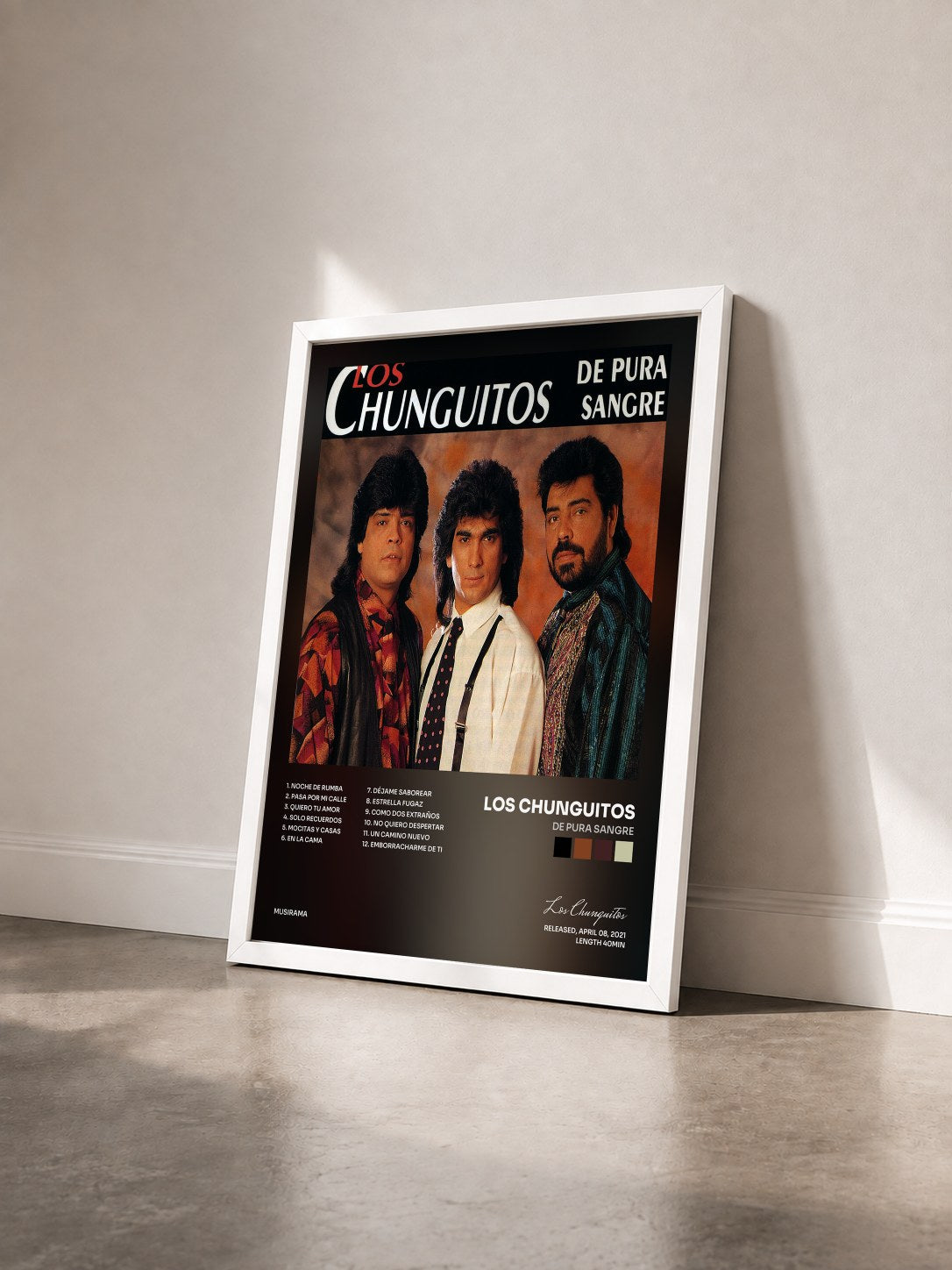 #blanc Tableau de l'album De Pura Sangre de Los Chunguitos vu de trois quarts, cadre blanc