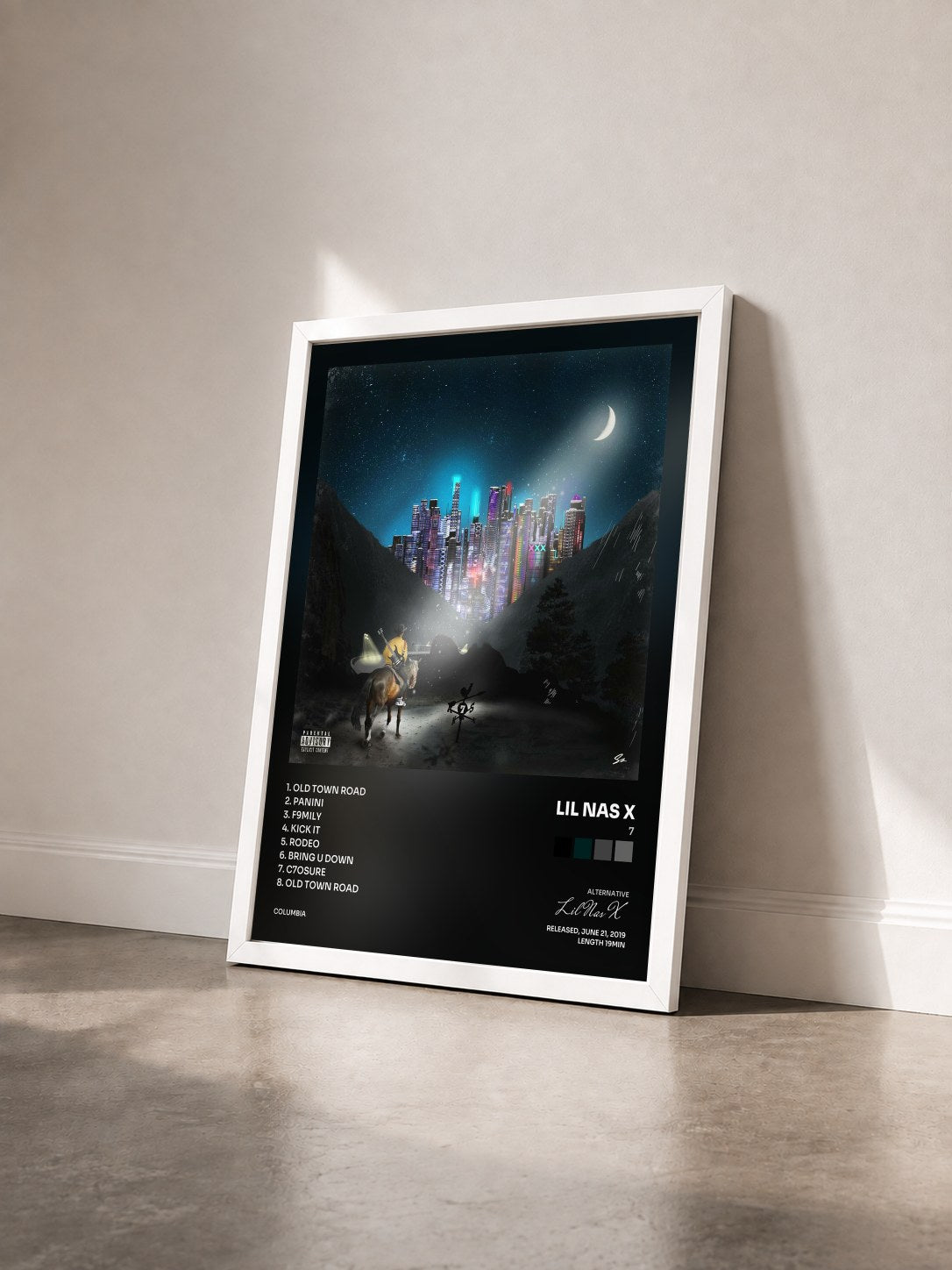#blanc Tableau de l'album 7 de Lil Nas X vu de trois quarts, cadre blanc