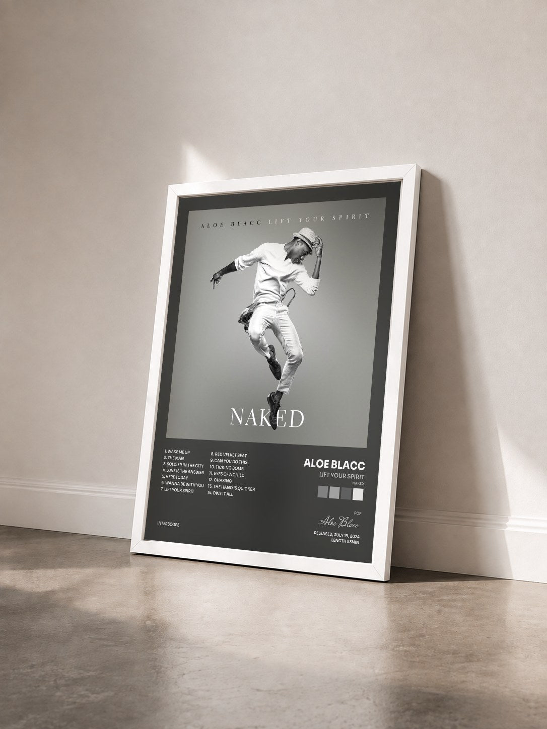 #blanc Tableau de l'album Lift Your Spirit (Naked) de Aloe Blacc vu de trois quarts, cadre blanc