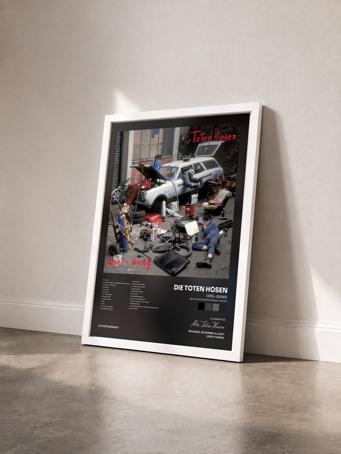 #blanc Tableau de l'album Opel-Gang (Deluxe-Edition mit Bonus-Tracks) de Die Toten Hosen vu de trois quarts, cadre blanc