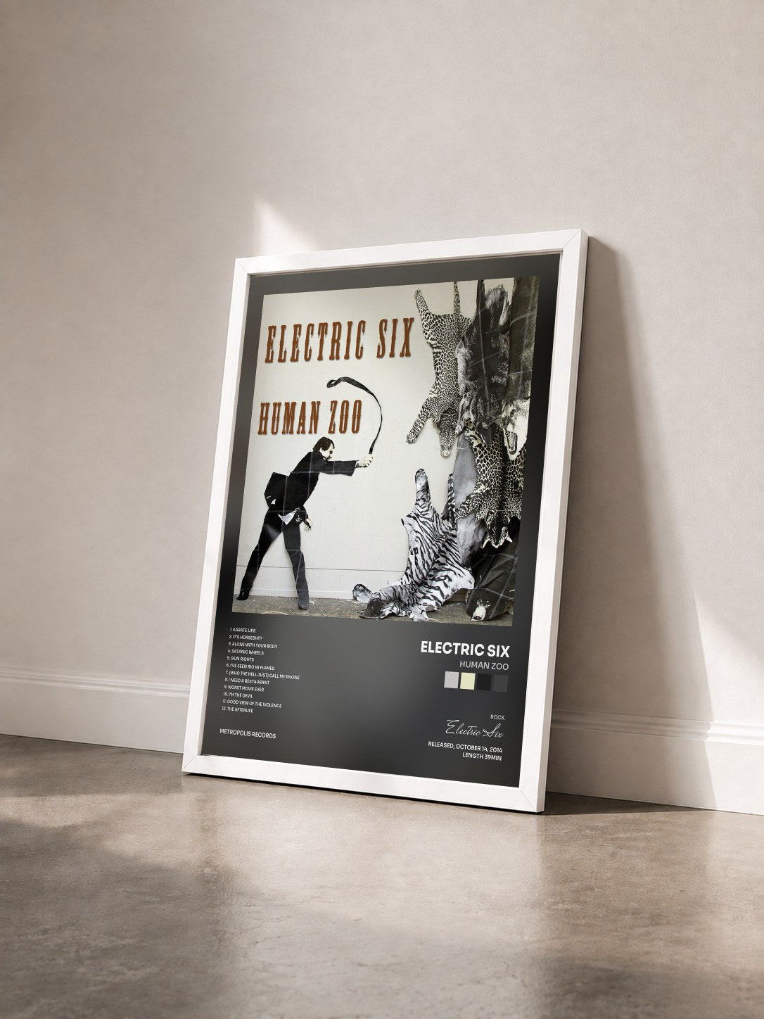 #blanc Tableau de l'album Human Zoo de Electric Six vu de trois quarts, cadre blanc
