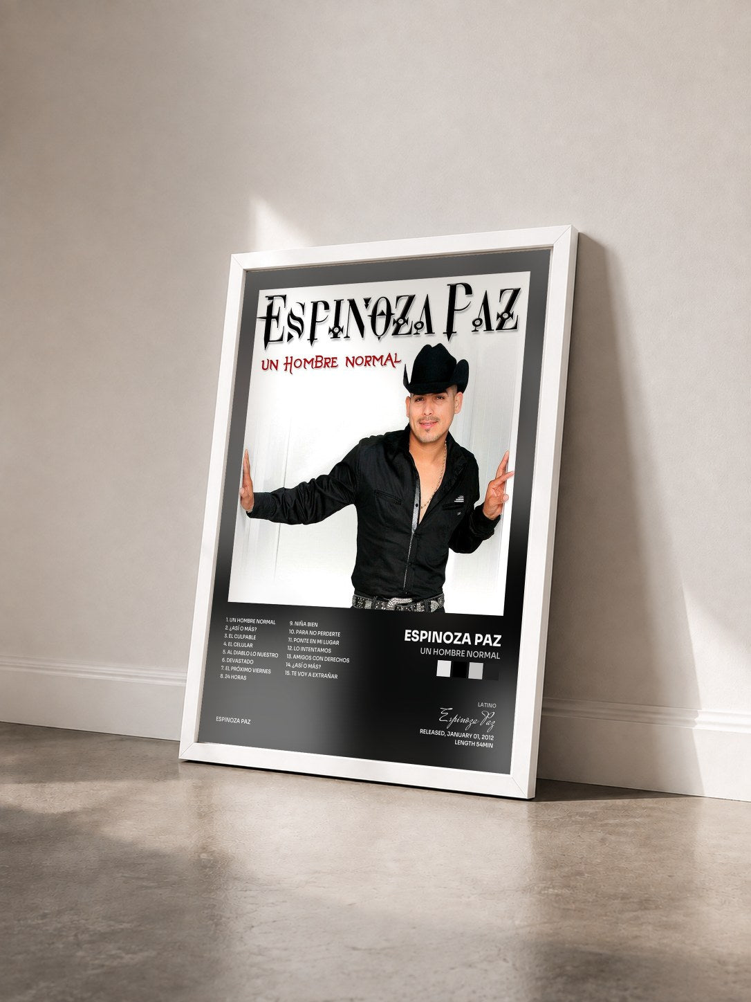 #blanc Tableau de l'album Un Hombre Normal de Espinoza Paz vu de trois quarts, cadre blanc