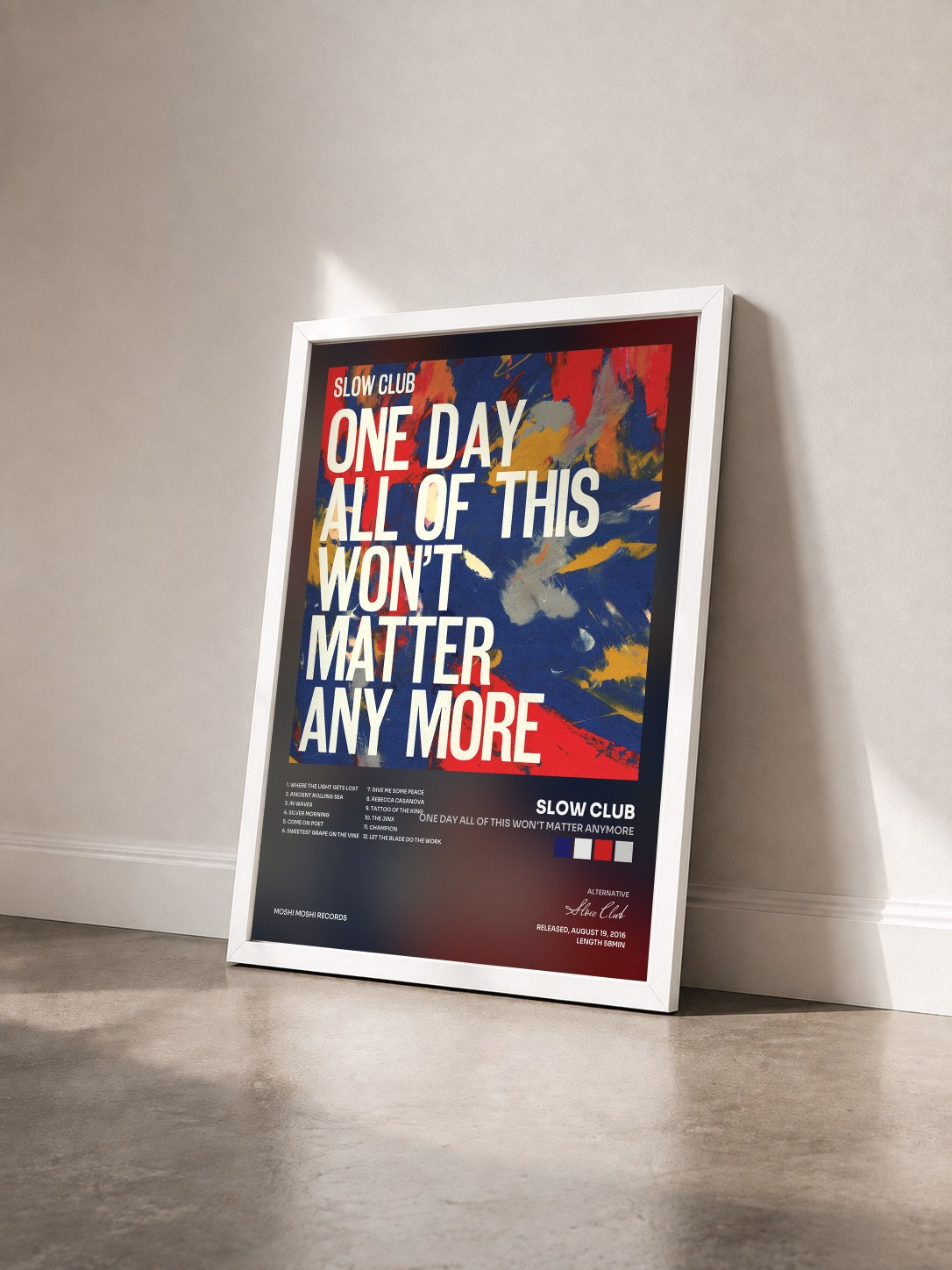 #blanc Tableau de l'album One Day All of This Won't Matter Anymore de Slow Club vu de trois quarts, cadre blanc