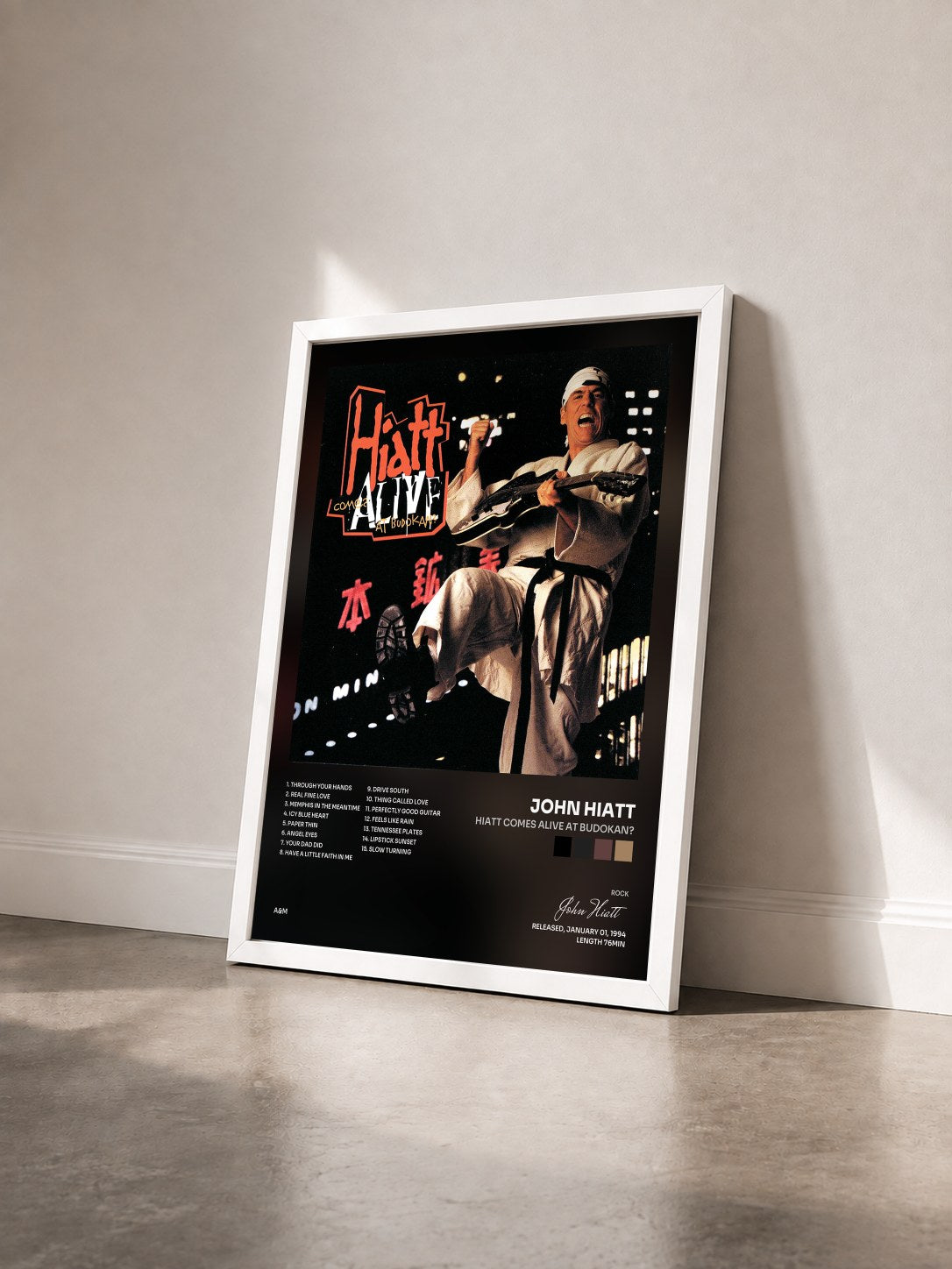 #blanc Tableau de l'album Hiatt Comes Alive At Budokan? de John Hiatt vu de trois quarts, cadre blanc
