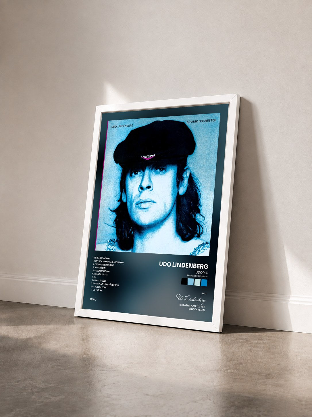 #blanc Tableau de l'album Udopia (Remastered Version) de Udo Lindenberg vu de trois quarts, cadre blanc
