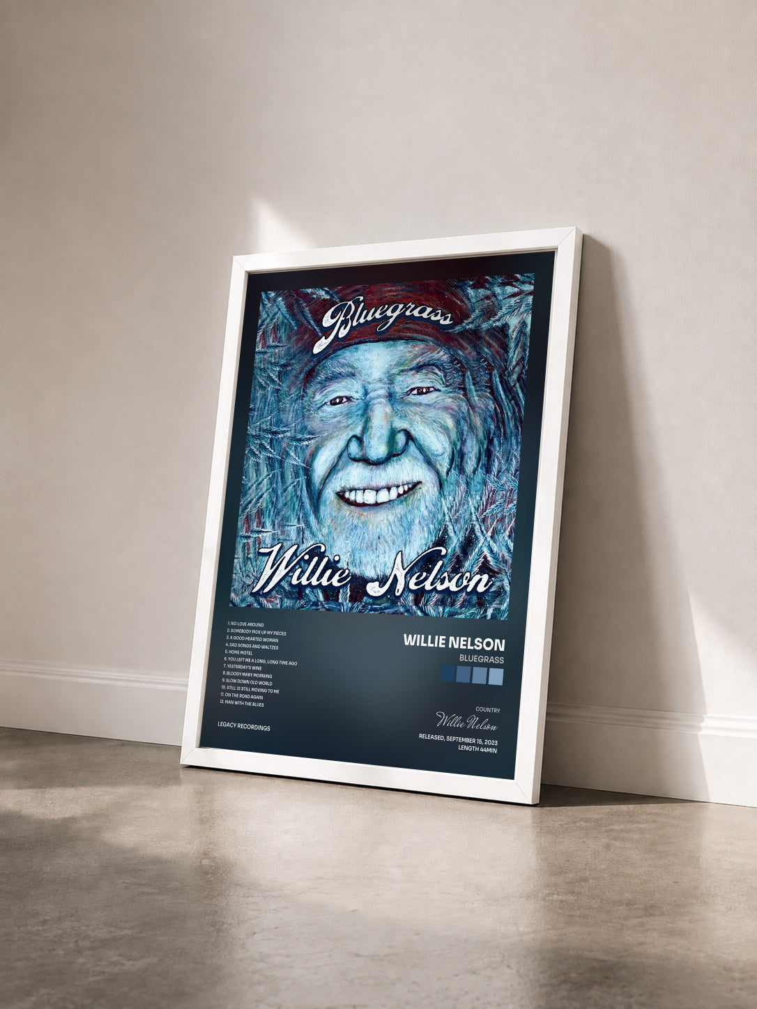 #blanc Tableau de l'album Bluegrass de Willie Nelson vu de trois quarts, cadre blanc