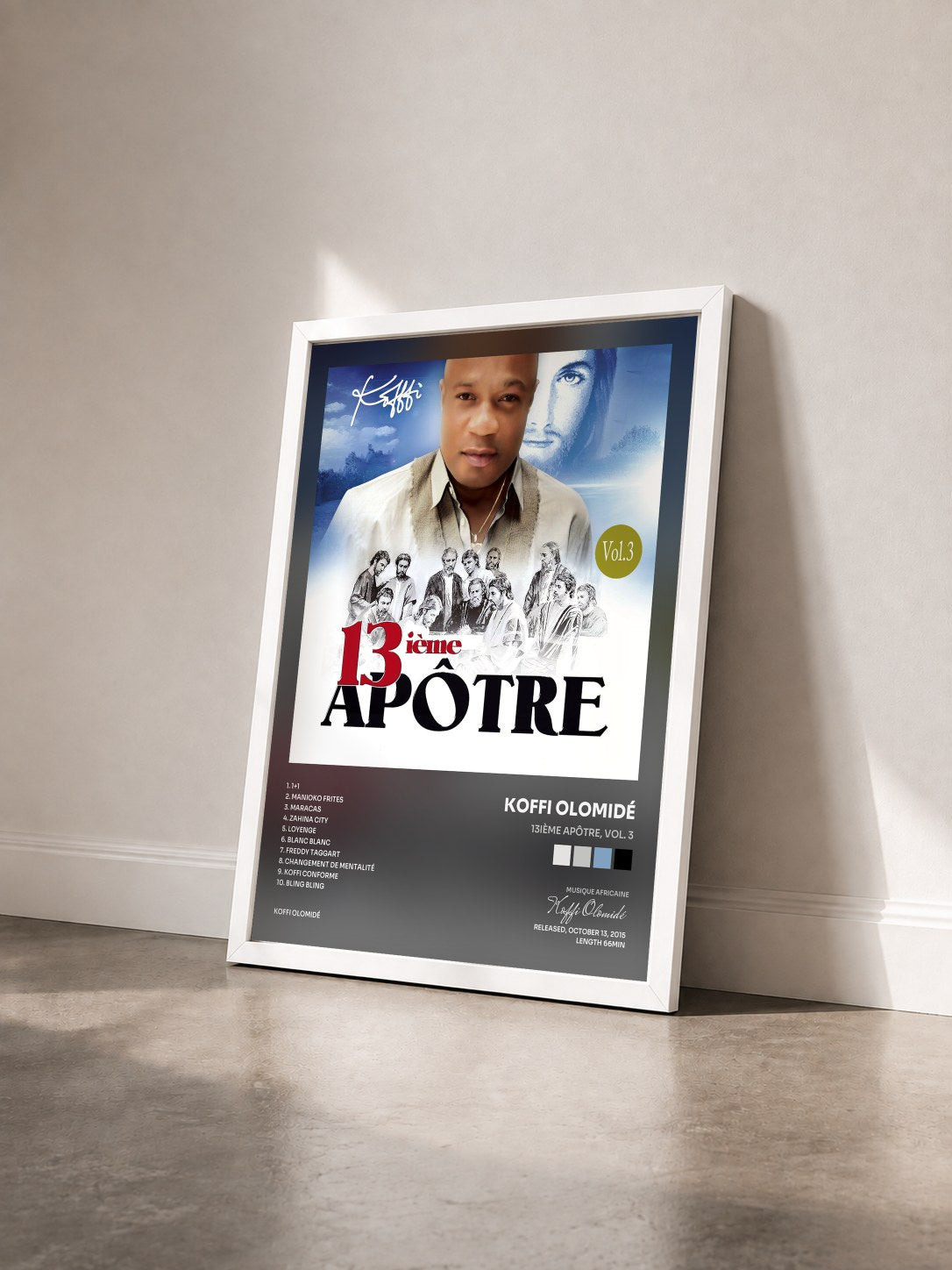 #blanc Tableau de l'album 13ième apôtre, Vol. 3 de Koffi Olomidé vu de trois quarts, cadre blanc
