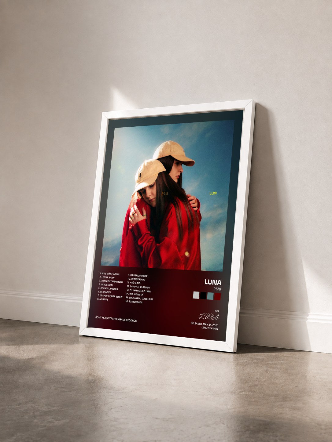 #blanc Tableau de l'album 25/8 de LUNA vu de trois quarts, cadre blanc