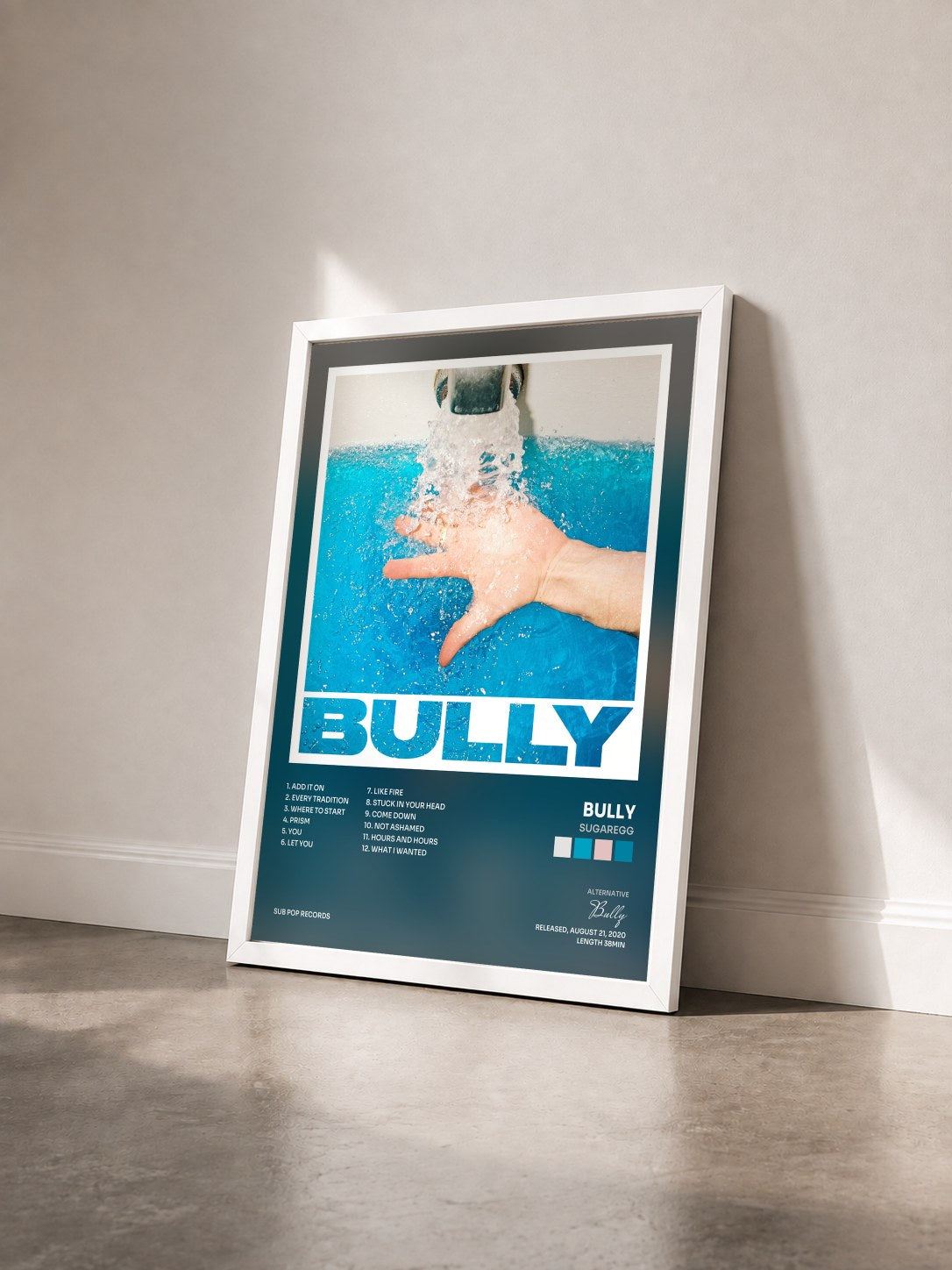 #blanc Tableau de l'album SUGAREGG de Bully vu de trois quarts, cadre blanc