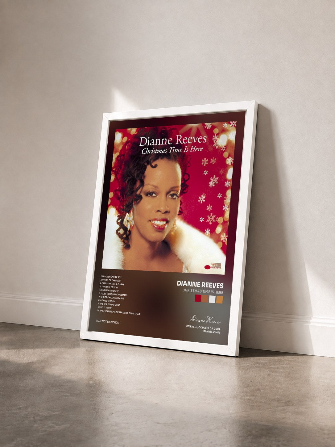 #blanc Tableau de l'album Christmas Time Is Here de Dianne Reeves vu de trois quarts, cadre blanc